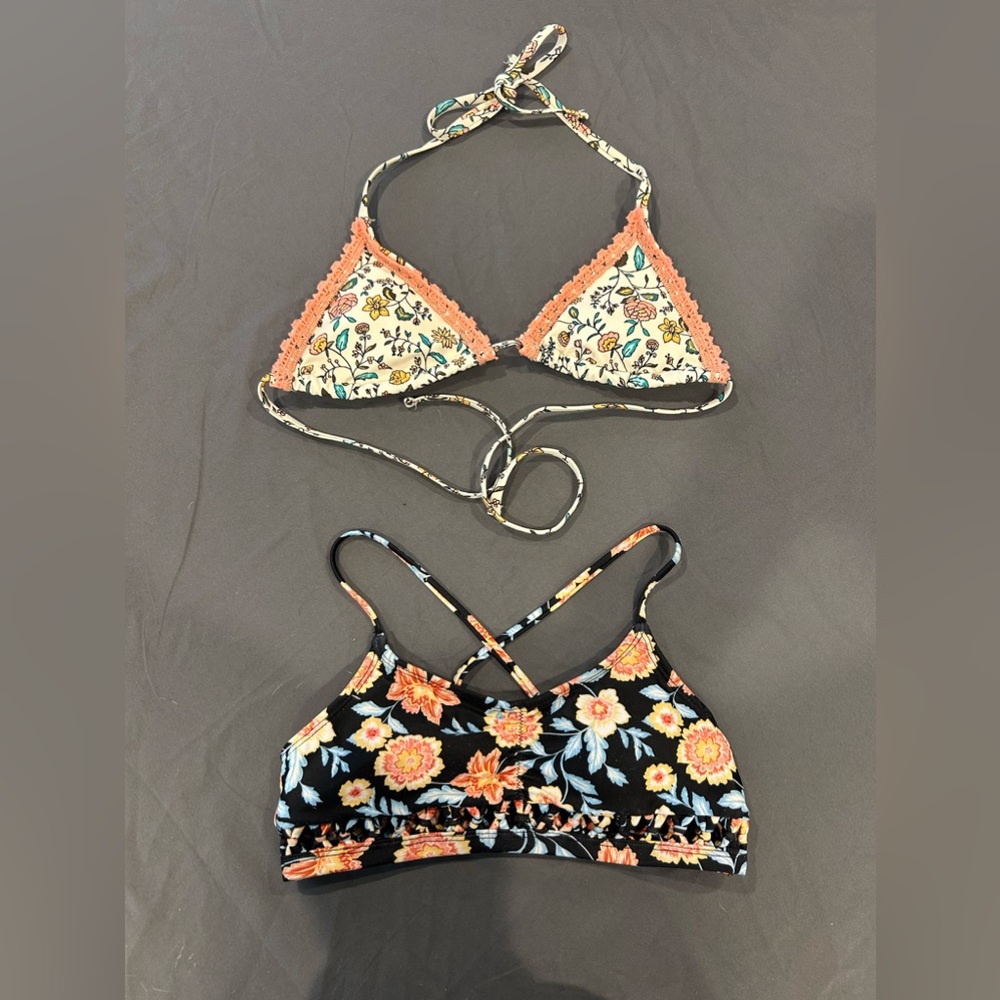 Two bikini tops, both floral pattern